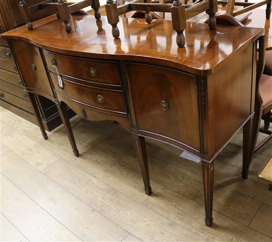 A George III style inlaid mahogany serpentine style sideboard W.164cm